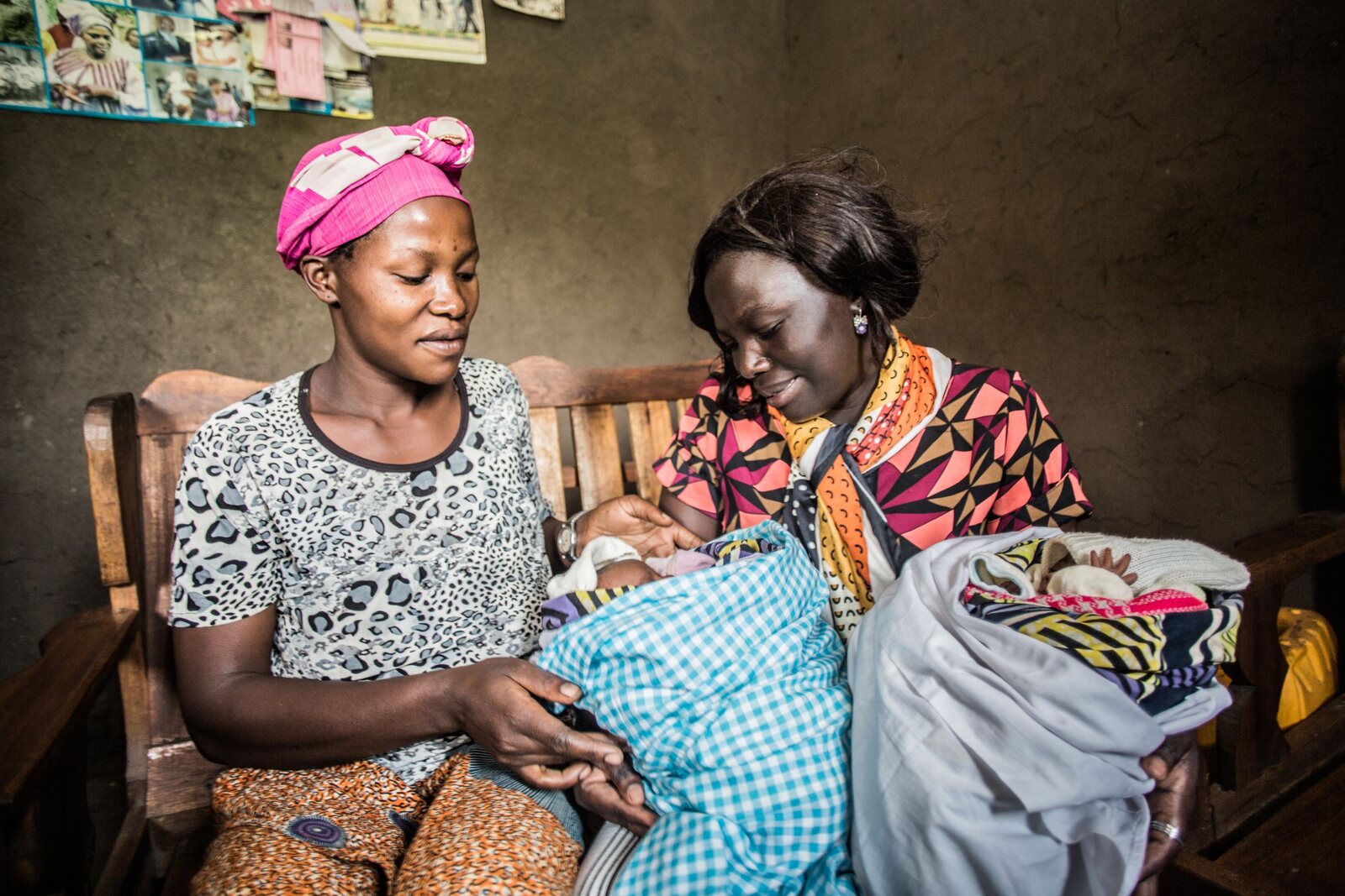 Two women with a newborn inside the center